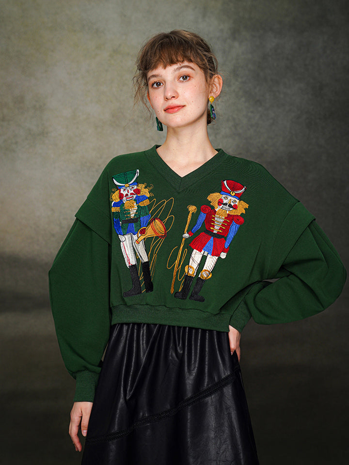 Nutcracker Embroidered Wide V-neck Hoodie with Spliced Sleeves
