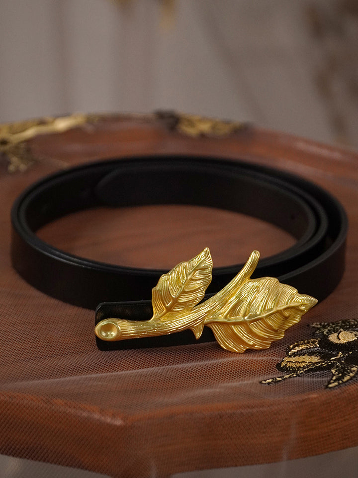 Metal belt with vintage style, featuring a leaf-shaped alloy and interchangeable buckle