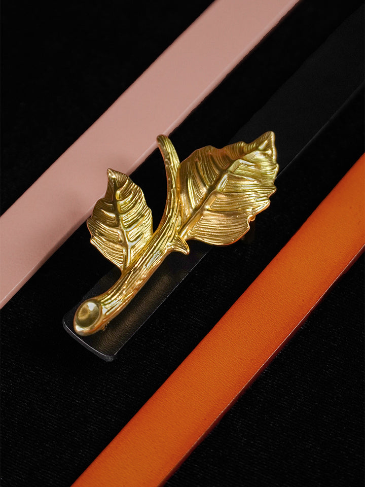 Metal belt with vintage style, featuring a leaf-shaped alloy and interchangeable buckle